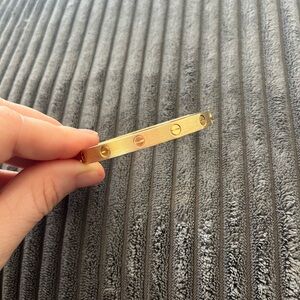 Brushed Gold tone Screw Motif Bracelet with mini screwdriver